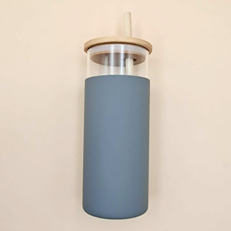 Gourde en verre avec sa paille