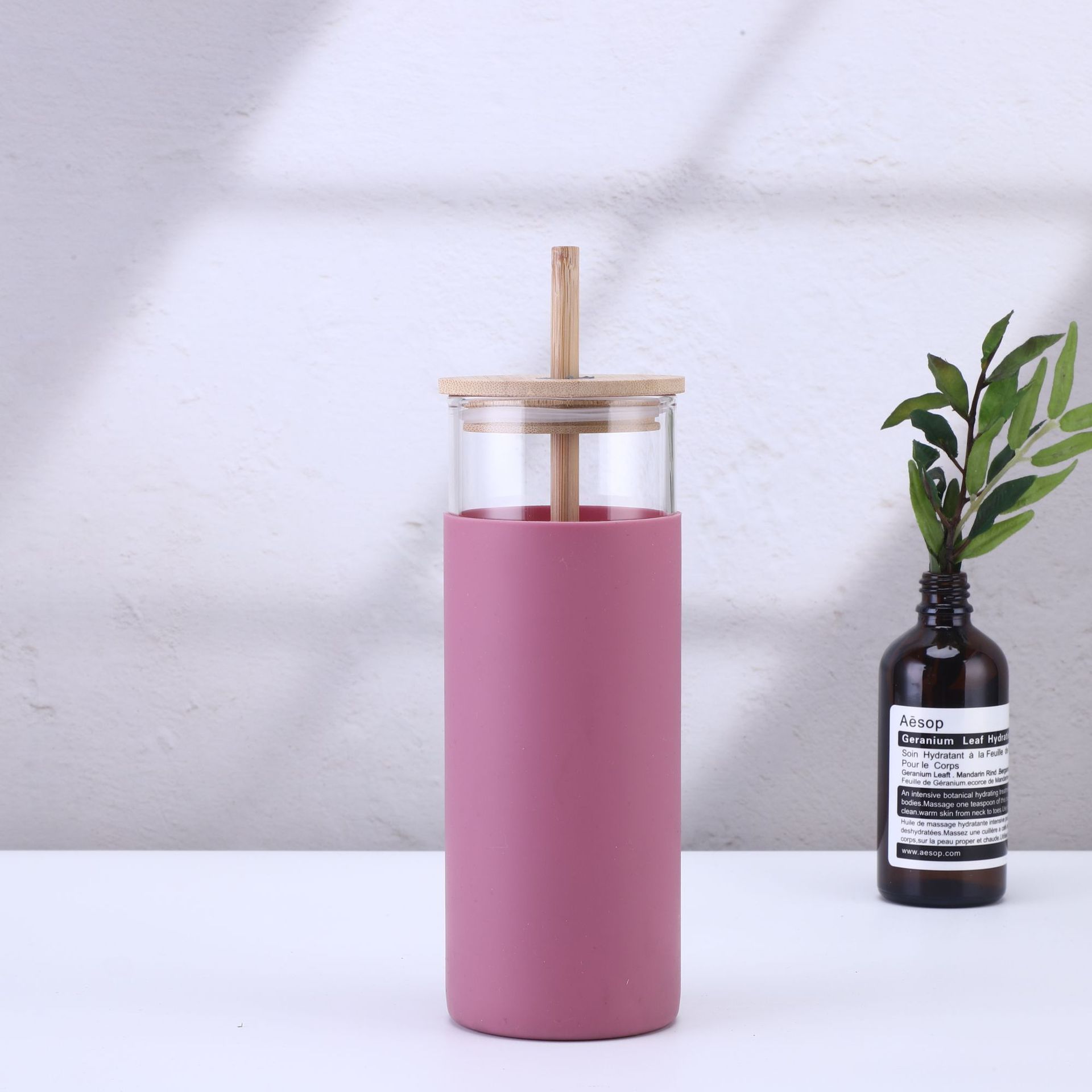 Gourde en verre avec sa paille